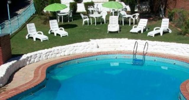 Hotel Aoma Villa Carlos Paz Esterno foto