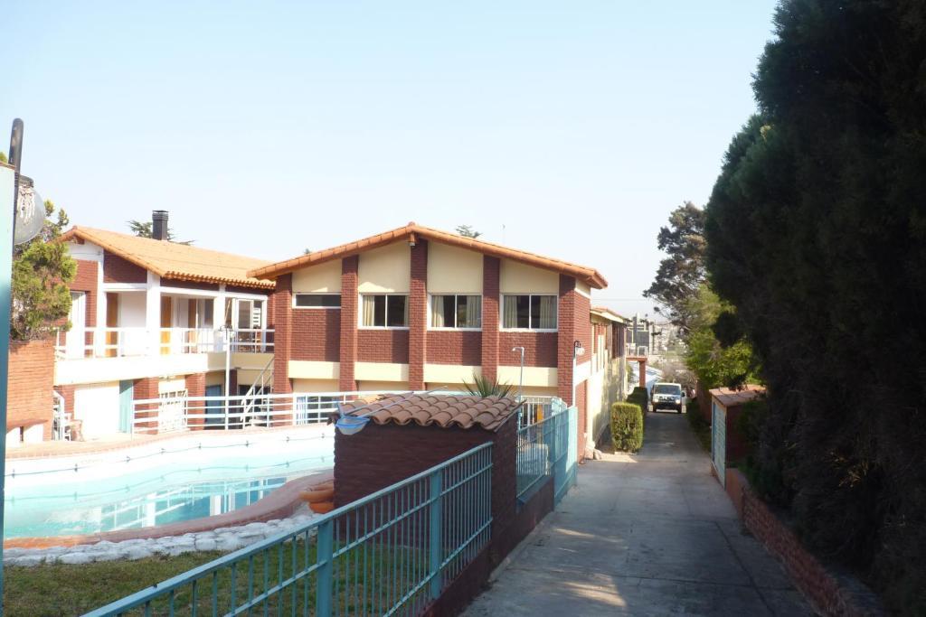 Hotel Aoma Villa Carlos Paz Esterno foto