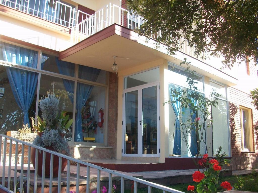 Hotel Aoma Villa Carlos Paz Esterno foto